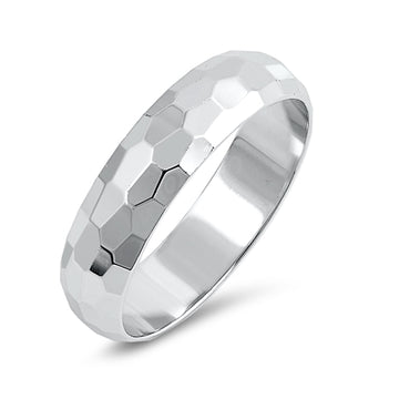 Lila is the perfect balance of elegance and edge at the same time. Great for stacking with other Starlette rings.

5mm sterling silver hammered band adds texture and depth to your look
Available in sizes 5 through 11