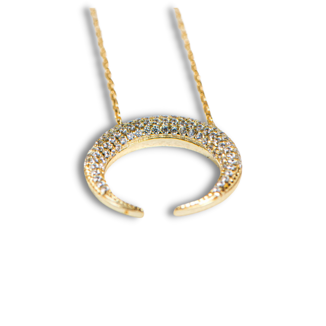 Created with certified 925 sterling silver
Plated in 14k gold or rhodium
100% simulated diamond material (AAA CZ) stones

The chain is extendable up to 17.5”, and the moon measures approximately 3/4”