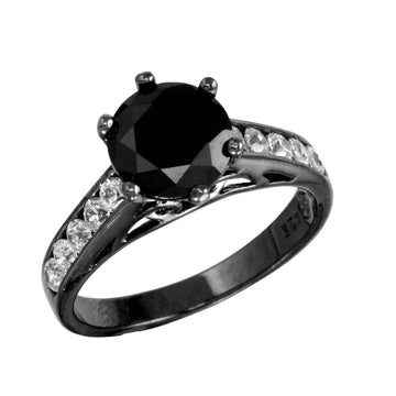 Black rhodium plated
Features a bold 1.5 carat black CZ center stone, plus five smaller clear CZ stones sparkling down the band

Available in sizes 5 through 9