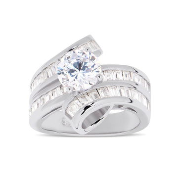Features a 1.50-carat round center stone
Surrounded by a unique twisted channel emerald band set in a prong setting
Sterling silver and plated in Rhodium
Available in sizes 4 through 10