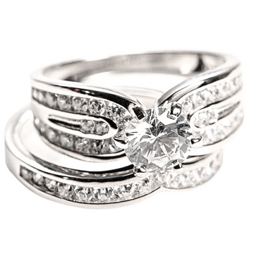 Features a 1.5-carat round cut center stone
Surrounded by a beautifully enhanced triple band design
Set in sterling silver with a prong and bezel setting
Plated in Rhodium

Available in sizes 4, 9, 11, 12, and 13